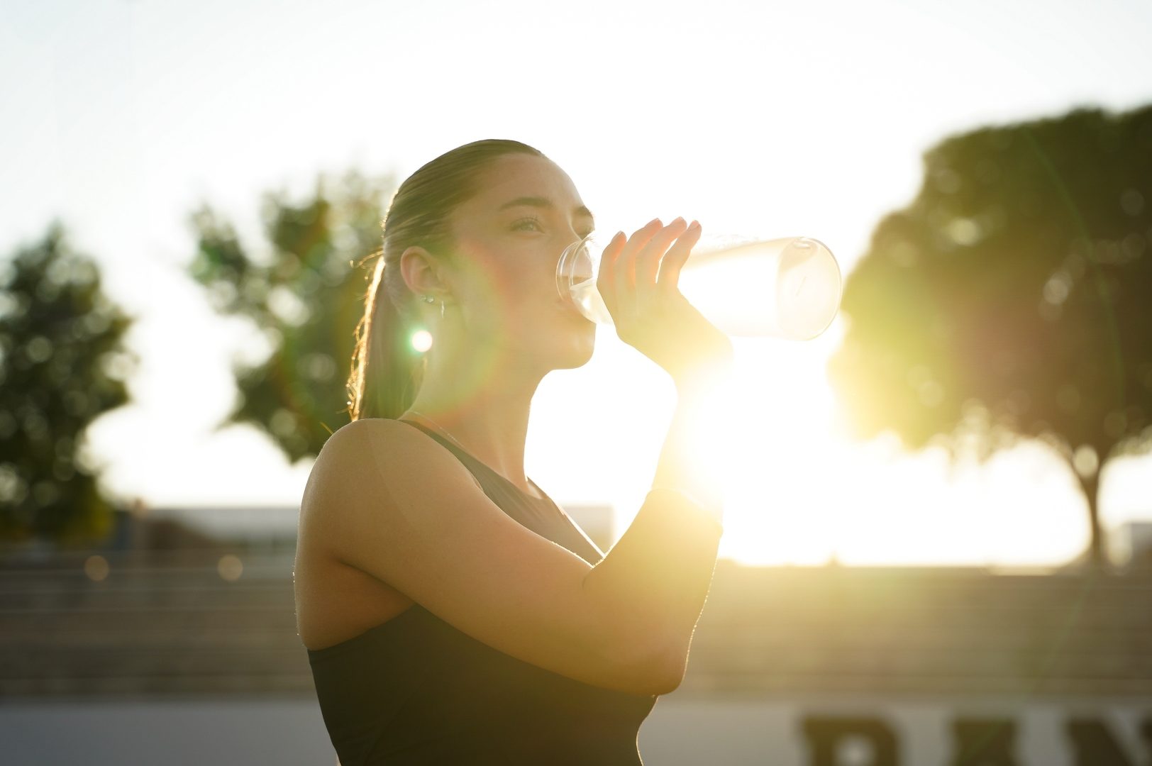 Athlete silhouetted at sunset